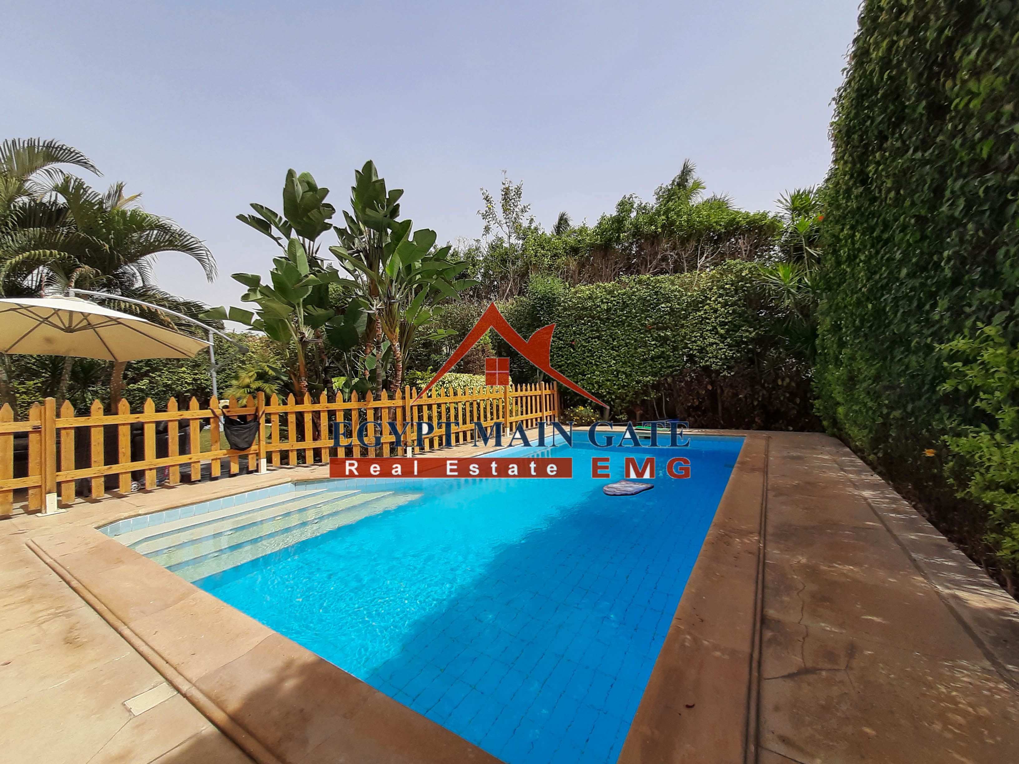Standalone villa with a big lovely garden and a nice swimming pool for sale in Katameya heights compound new Cairo 