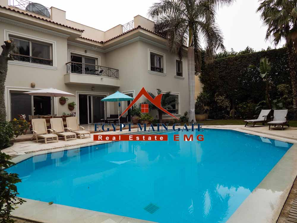 Villa with a nice garden and pool for sale in katameya heights compound new cairo