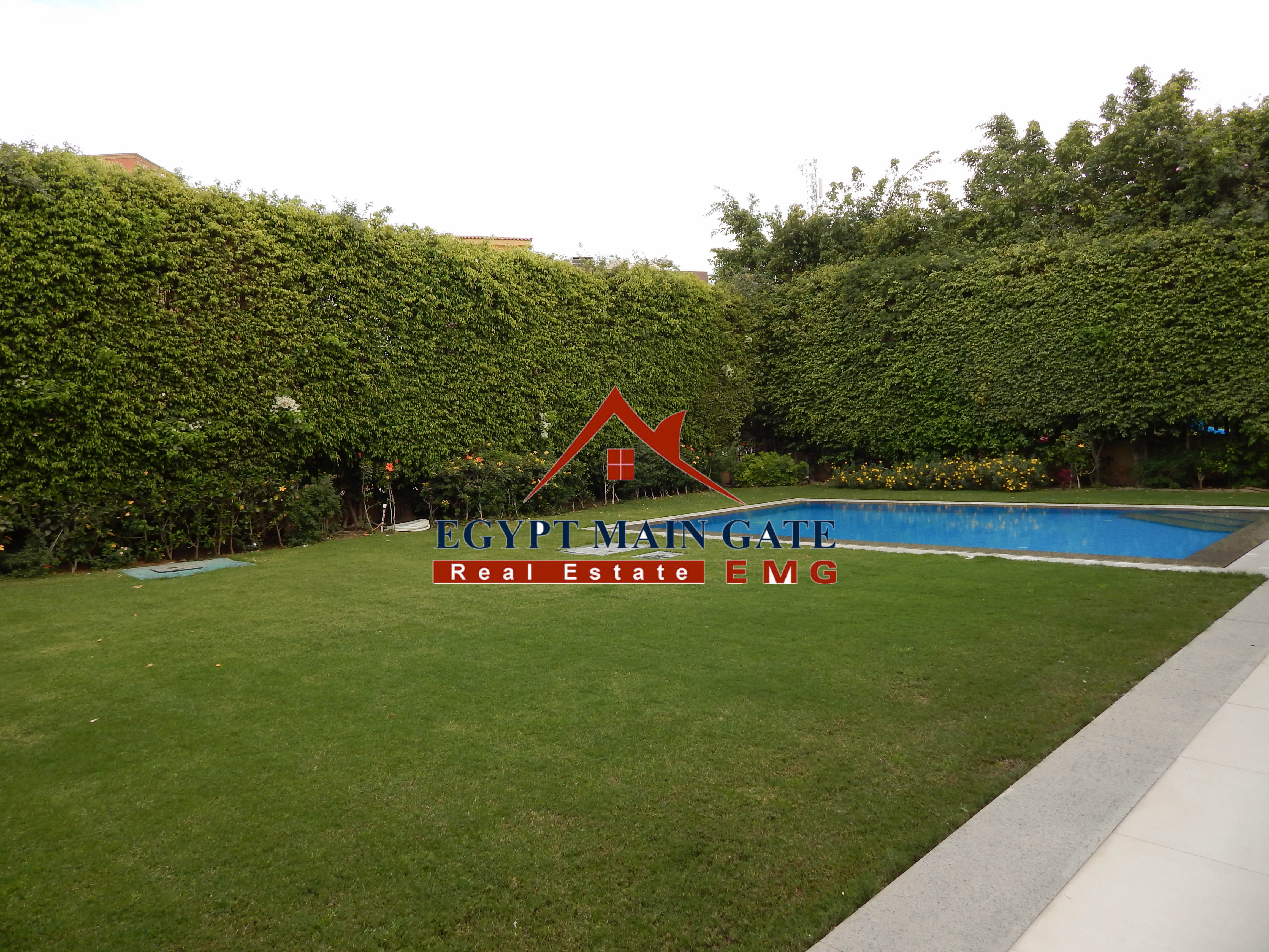 Villa for sale with a lovely garden and pool in Katameya heights